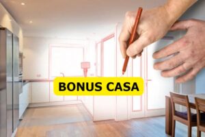 mano disegna progetto casa, scritta bonus casa