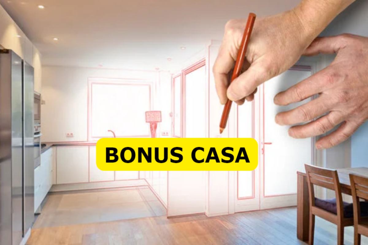mano disegna progetto casa, scritta bonus casa