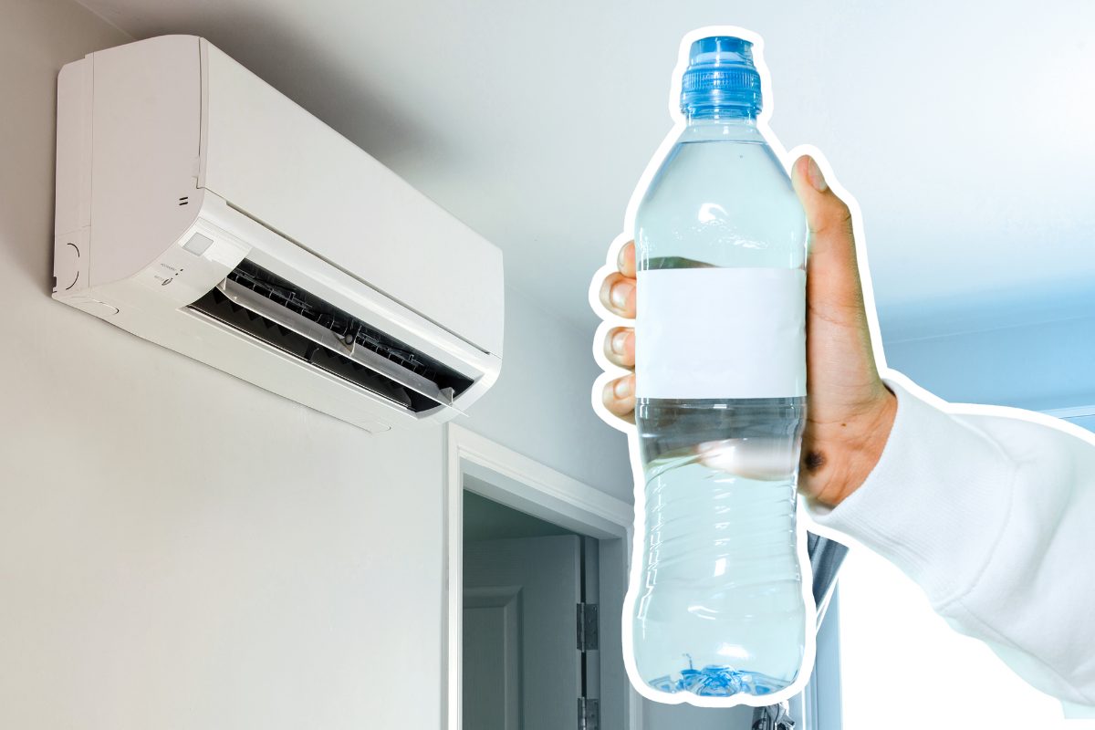 condizionatore e bottiglia acqua in mano